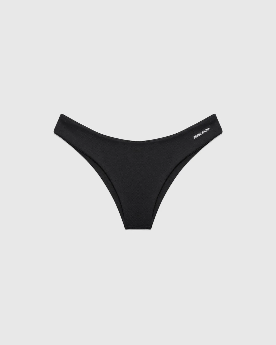 Aino Sauna Bikini Bottom in black on a grey background
